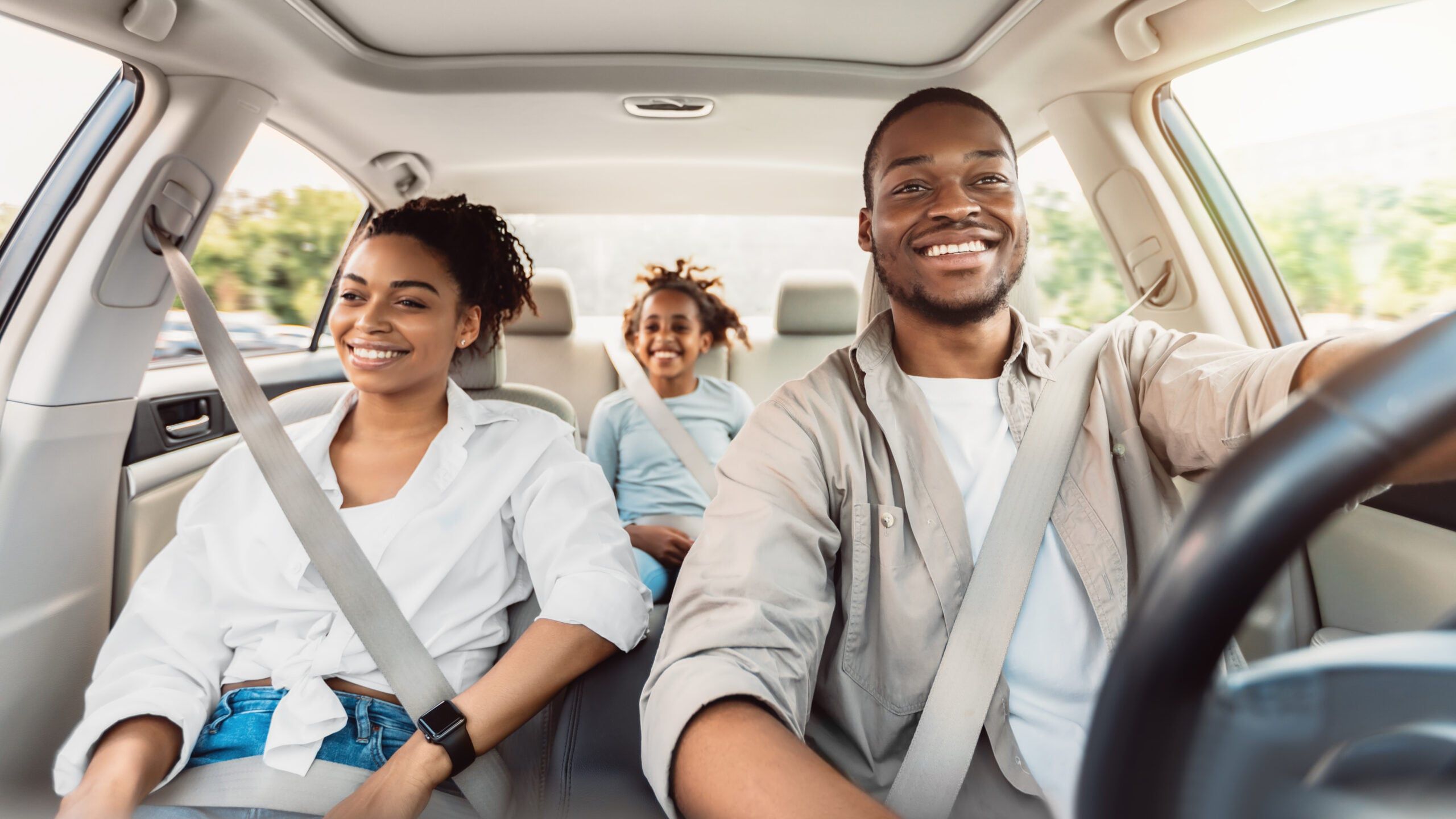 Happy family on a road trip.