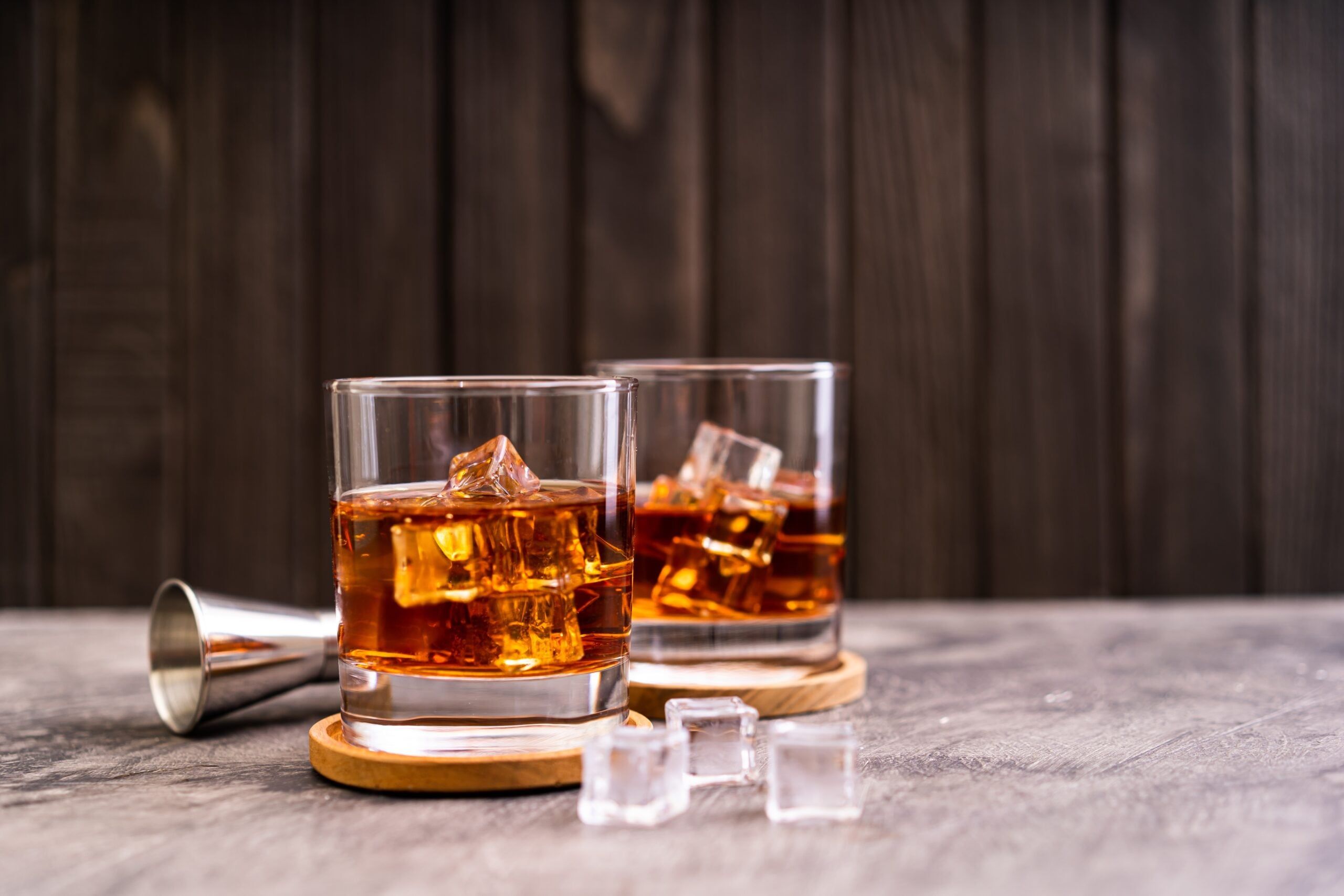 Two drinks on a counter.
