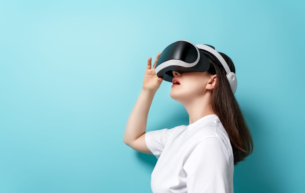 Woman wearing virtual headset.