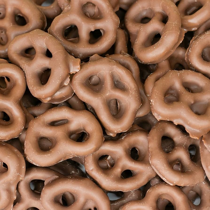 A bowl of chocolate covered pretzels.