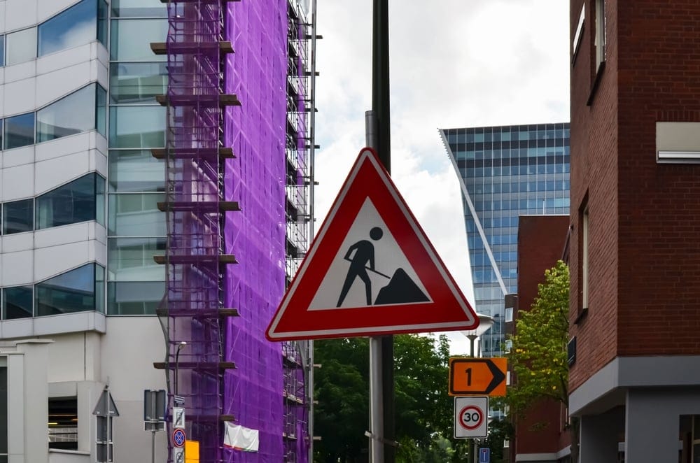 Traffic sign showing road works or maintenance is ongoing