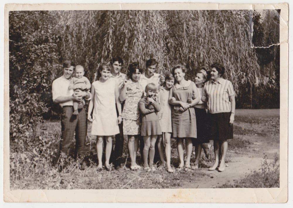 A throwback picture of different people across different age ranges