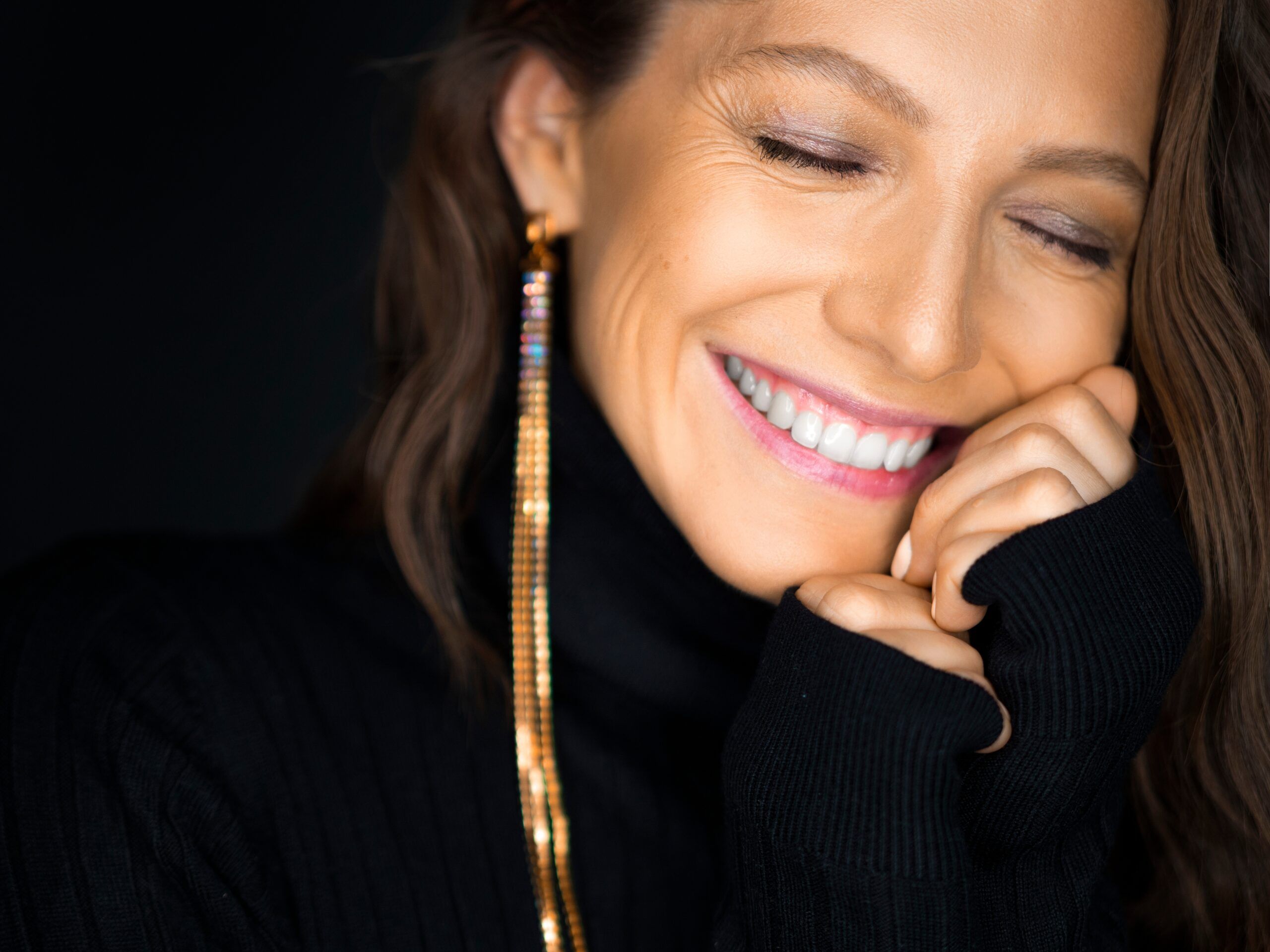 Confident and happy woman smiling.