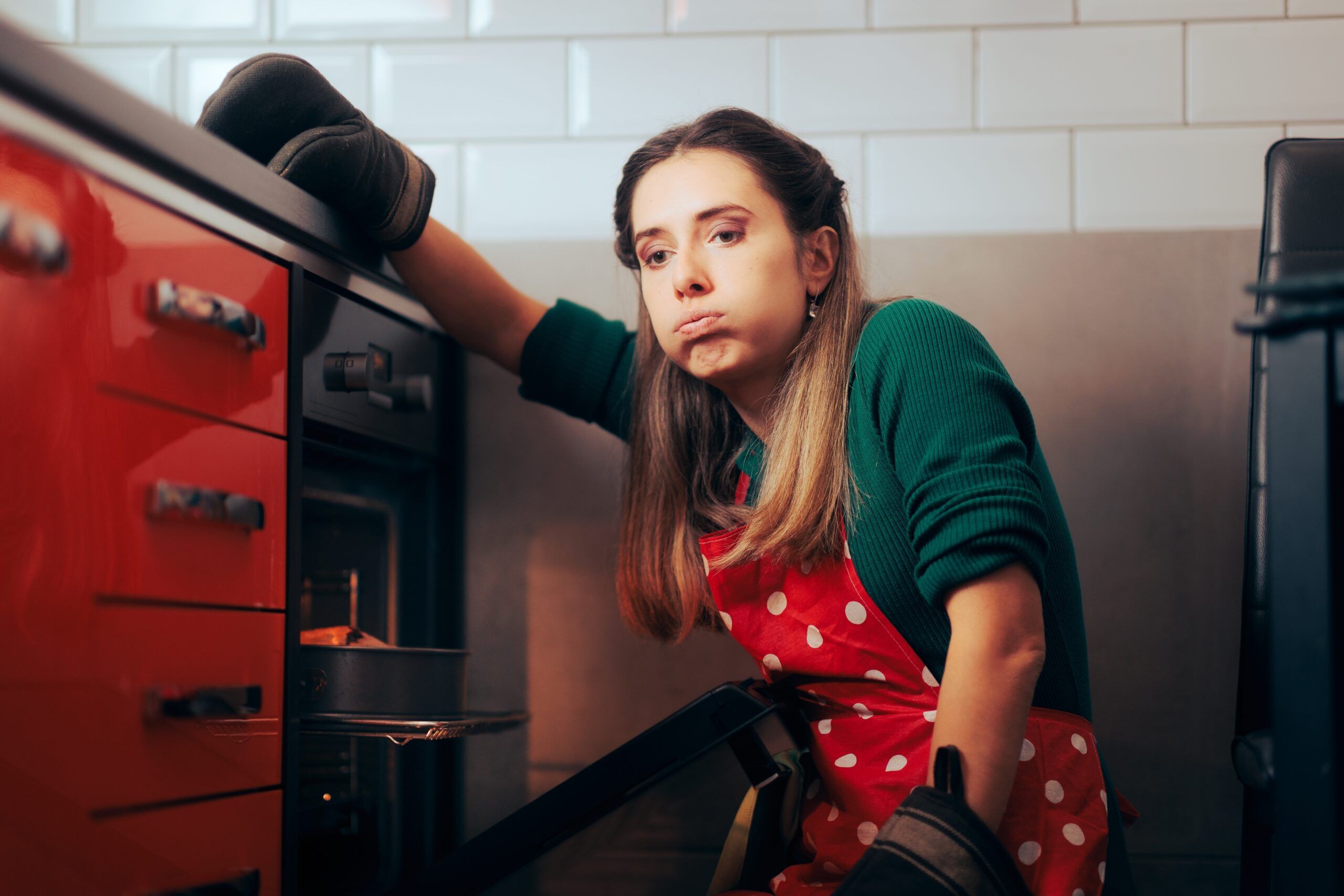 A tired housewife is overwhelmed by her work load.