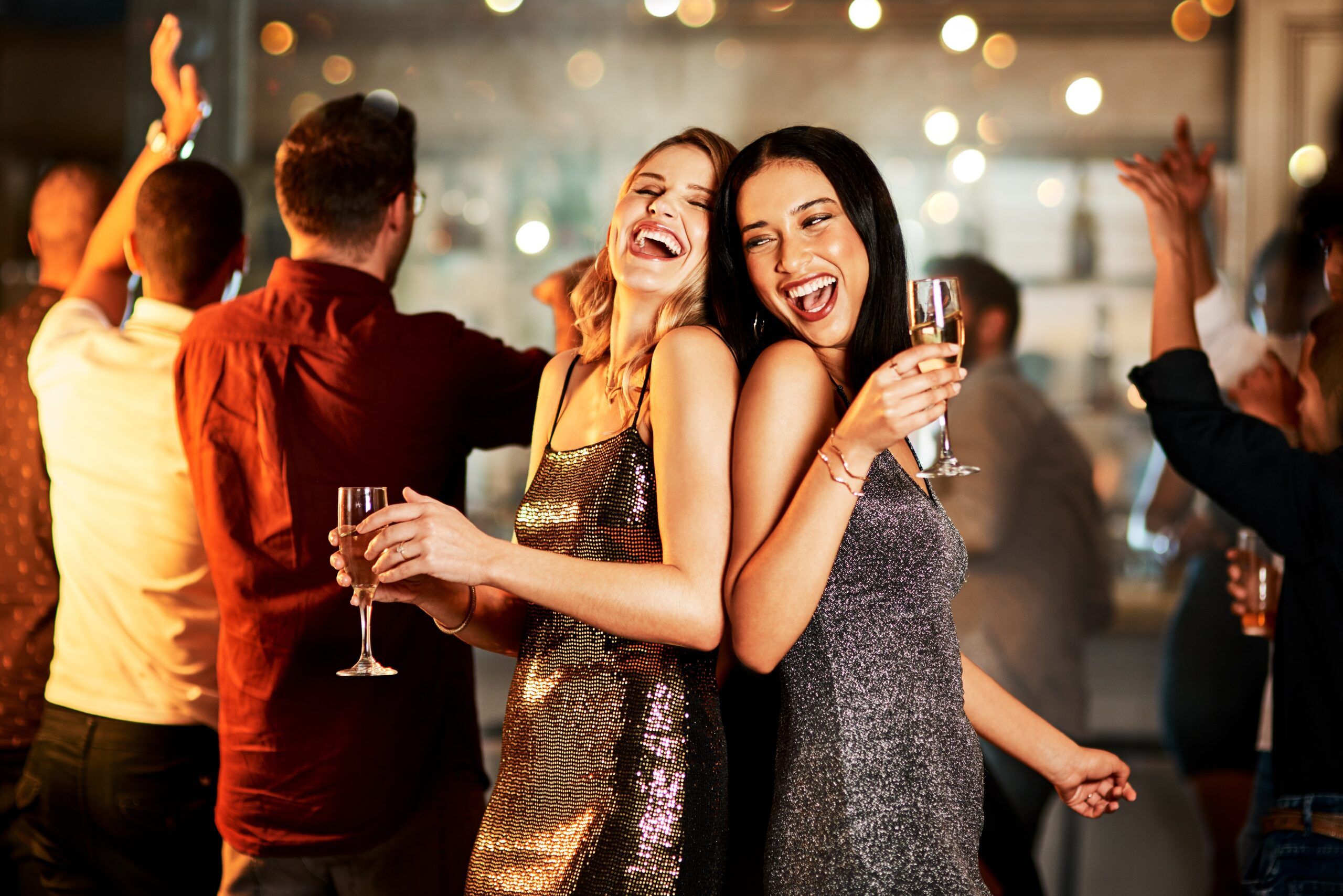 Women having fun on the dance floor at a party.