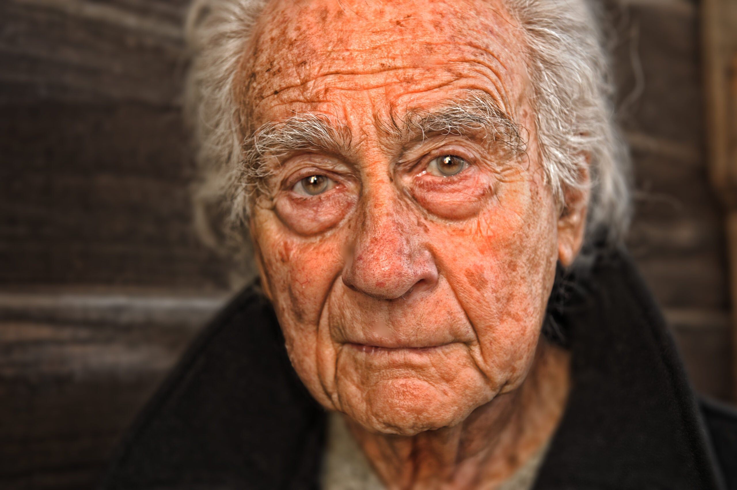 An older gentleman reflecting on the regret and sadness in his life.