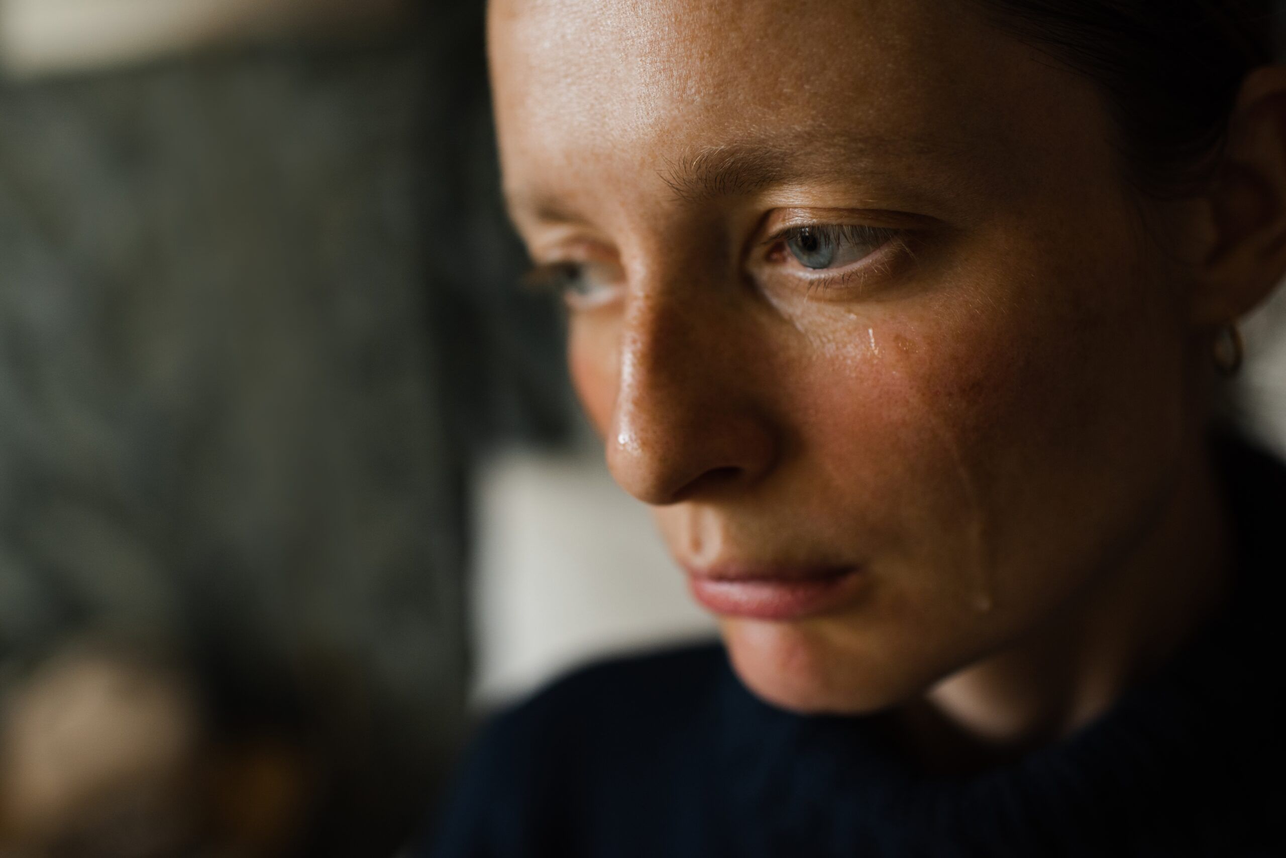 A woman experiencing an emergency by herself.