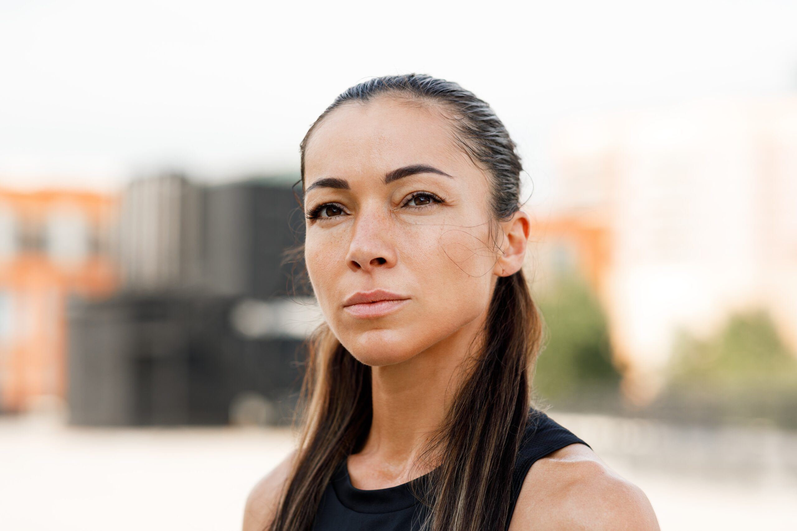 A confident looking woman after her workout.