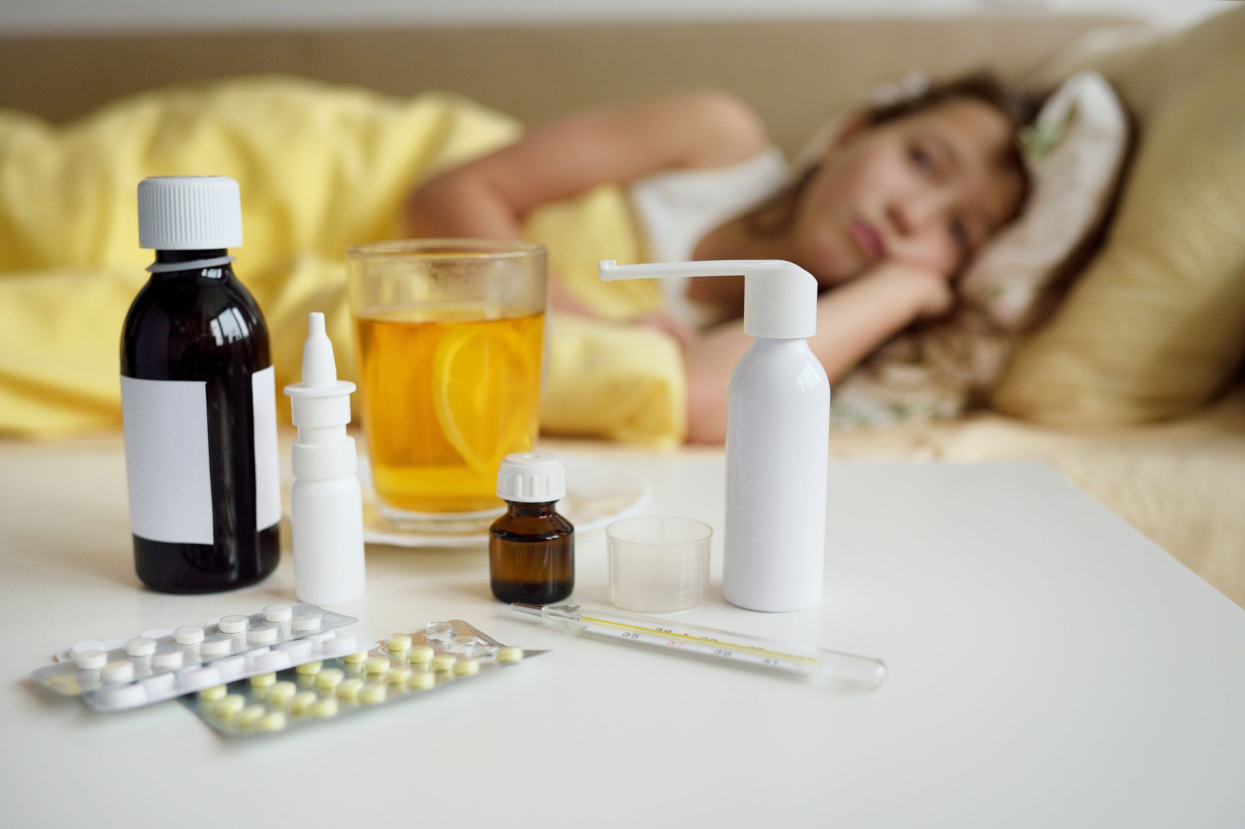 A woman sick at home alone with the flu.