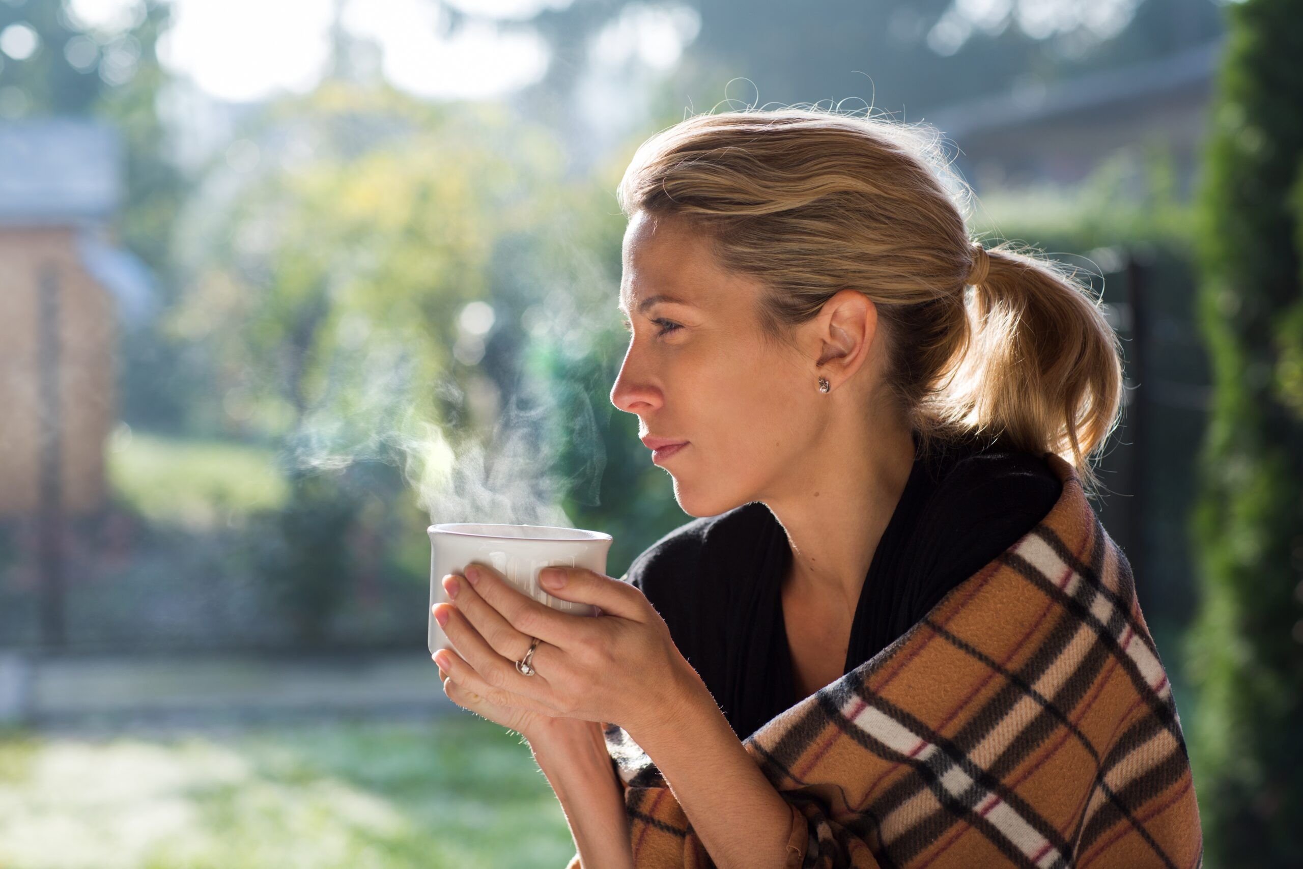Woman spending time alone in her garden.