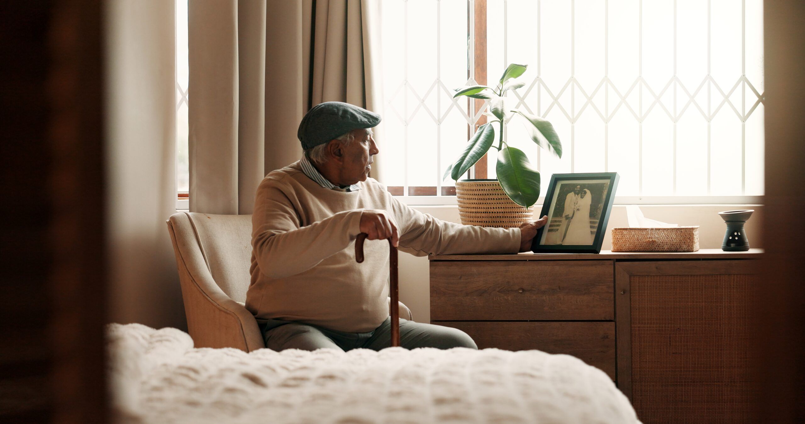 A senior man grieving his wife.