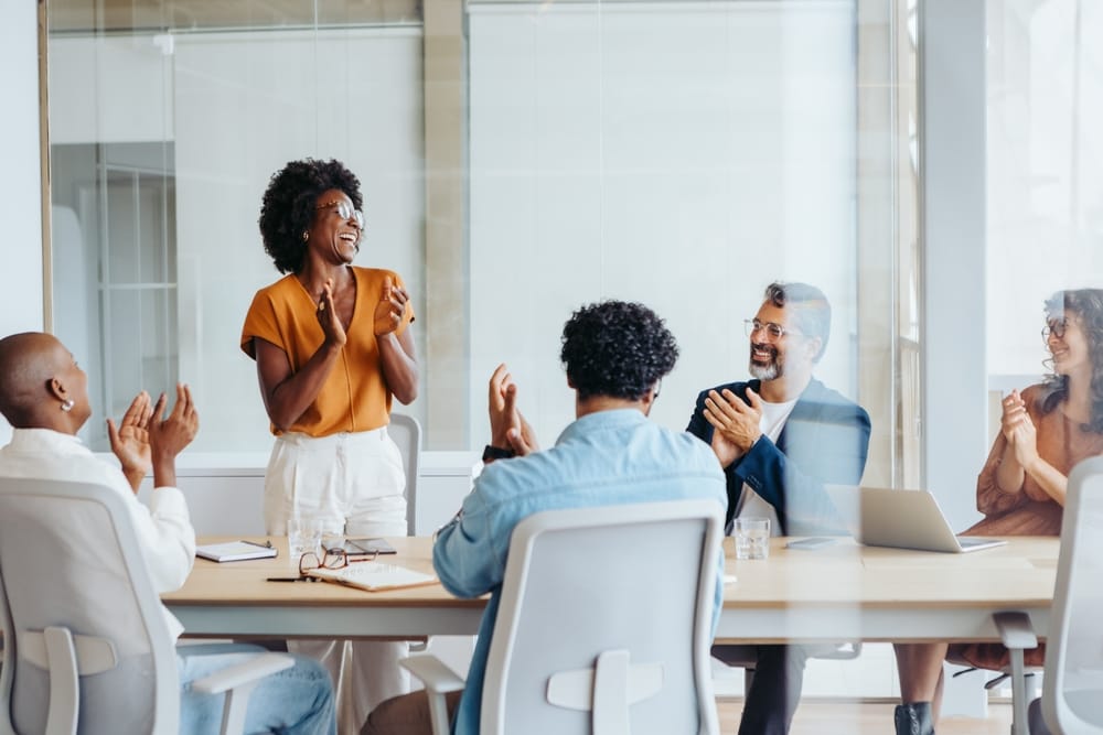 A group of business people in an office.