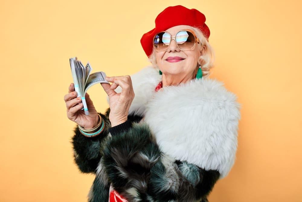 13 Unmissable Signs Someone Has Tons of Money