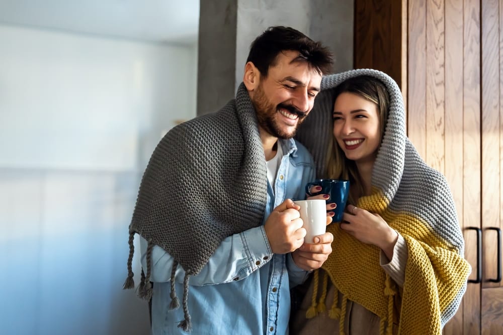 13 Smart Ways To Lower Your Electric Bill Without Freezing All Winter