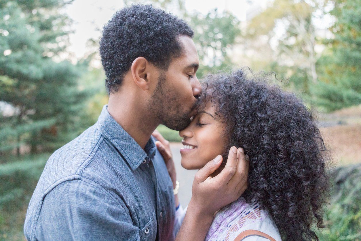 The Forehead Kiss: What It Means & Why It’s So Special