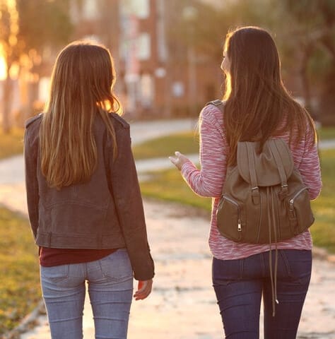 two young females walking