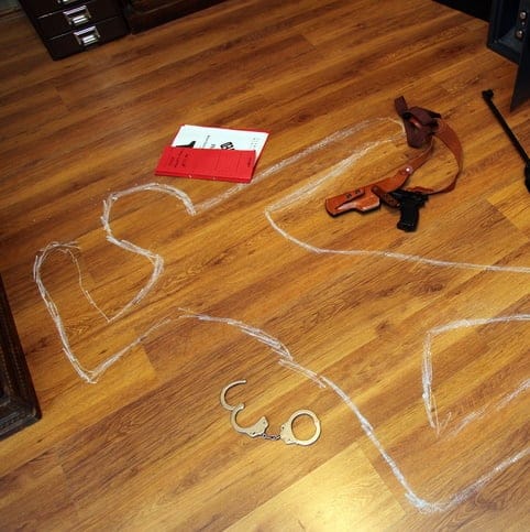 Woman Shocked To Find Chalk Outline Of ‘Body’ With Case Number Under Her Living Room Carpet