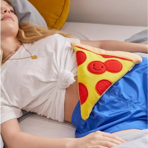 This Smiling Pepperoni Pizza Heating Pad Will Make Cramps A Lot Less Painful