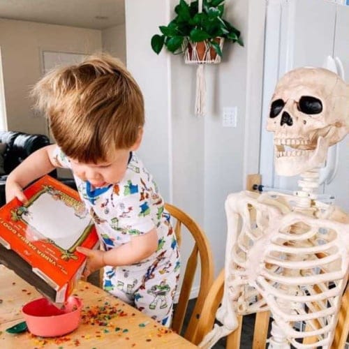 This Little Boy Is Best Friends With A 5-Foot Skeleton And It’s Super Cute