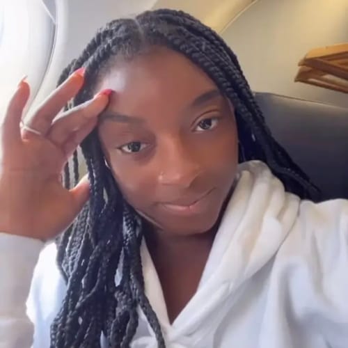 Simone Biles Mistaken For Child And Offered Coloring Book By Flight Attendant