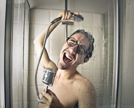 Singing in the shower.