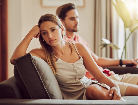 Unhappy young couple.