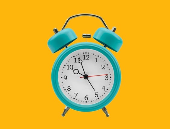 Retro blue alarm clock.