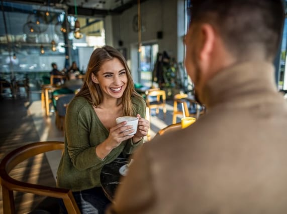 flirty couple on coffee date