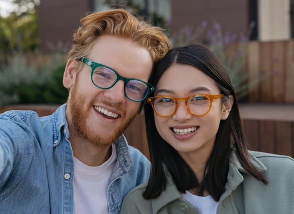 A smiling couple on a walk.