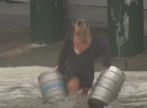 Woman Risks Her Life By Jumping Into Ocean To Save Beer Kegs During Dangerous Storm