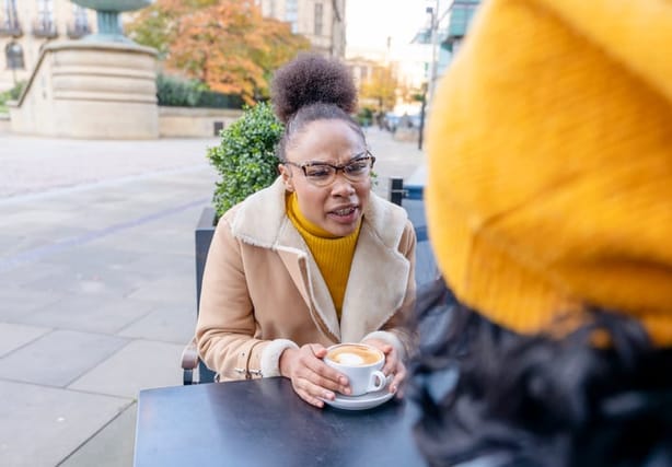 woman trying to make a serious face