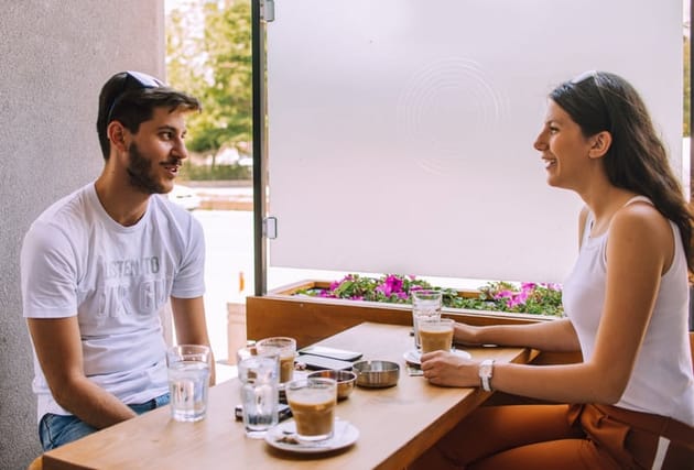 couple having lunch outdoor restaurant