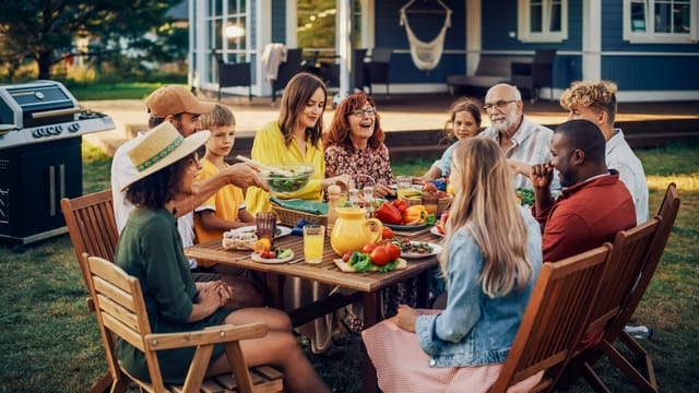 friends at a massive dinner party