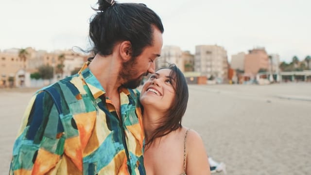 adoring couple at beach