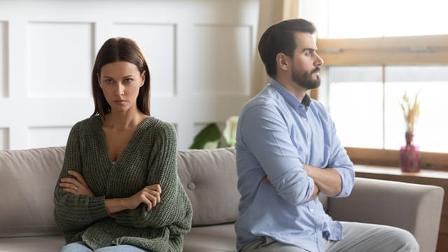 Frustrated thoughtful girlfriend ignoring boyfriend after quarrel, bad relationship