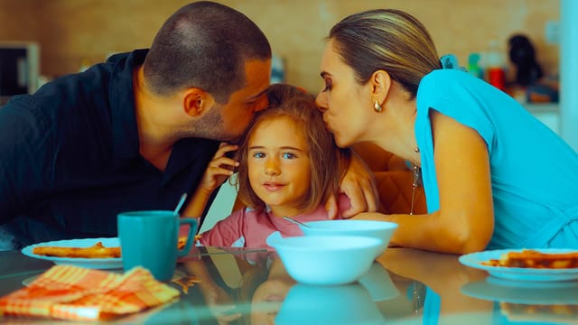 mom and dad dote on only child