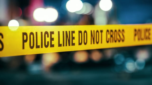 Yellow Tape Showing Text Police Line Do Not Cross.