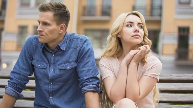 A woman refuses to talk to her boyfriend.