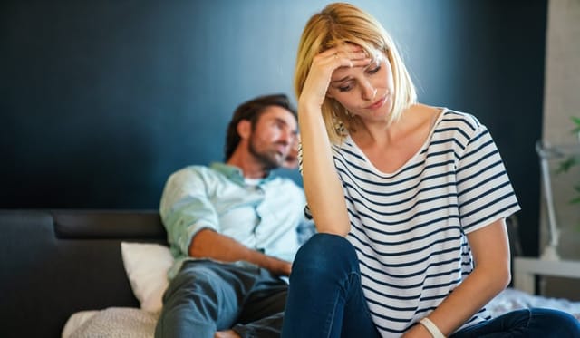 Young sad couple, family having financial problems, depression, crisis. People divorce, stress concept.