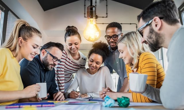 colleagues working together in office