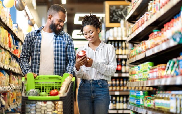 Couple buying groceries.