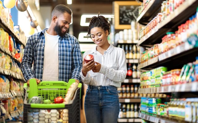 Couple buying groceries.