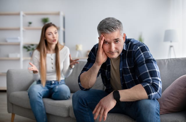 Father and daughter in a serious chat.