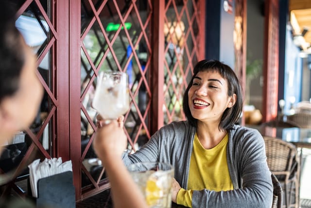 young couple at outdoor cafe date