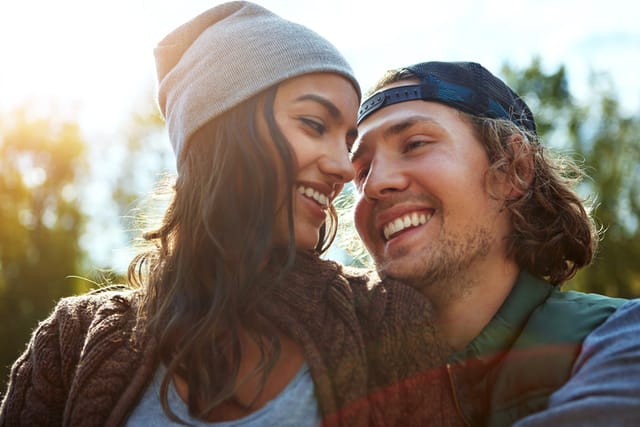 couple sharing tender moment outdoors