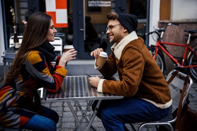 hipster couple outdoor coffee date