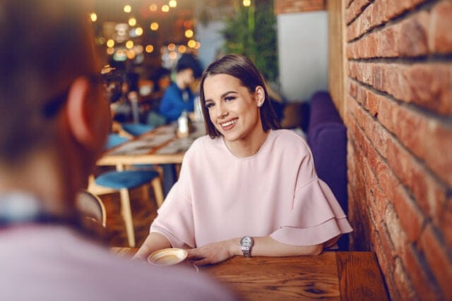 woman smiling at date