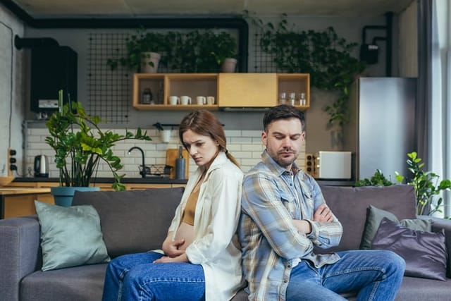 couple after argument on couch