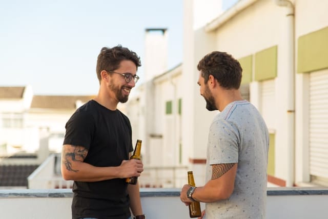 guy friends talking with beer