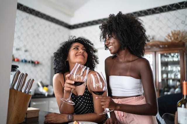 flirting lesbian couple in kitchen